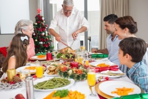 Extended family at dining table for christmas dinner